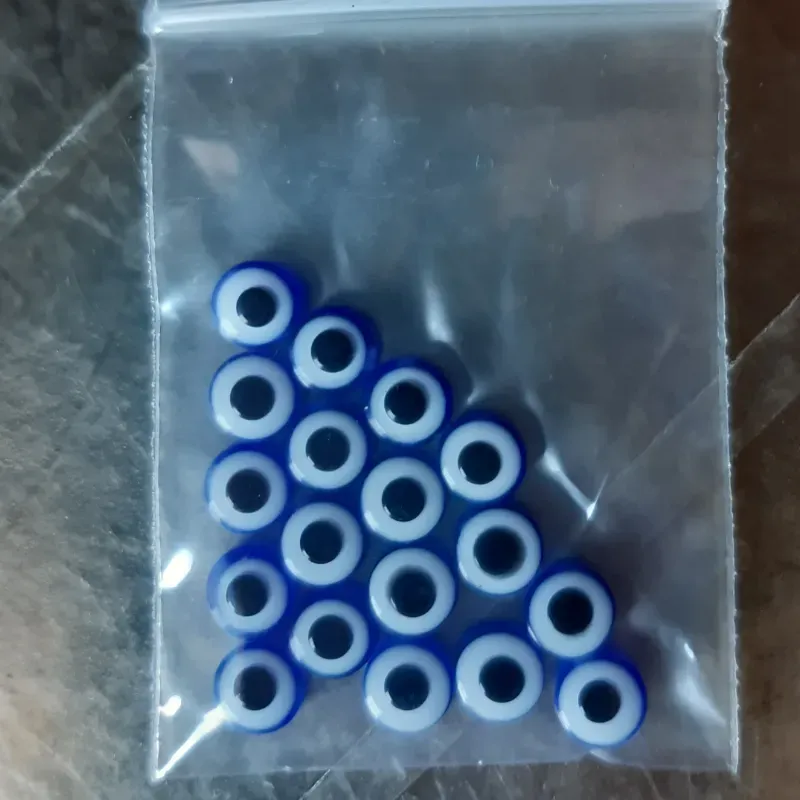 OJO TURCO PLANO 6MM 18 UNIDADES