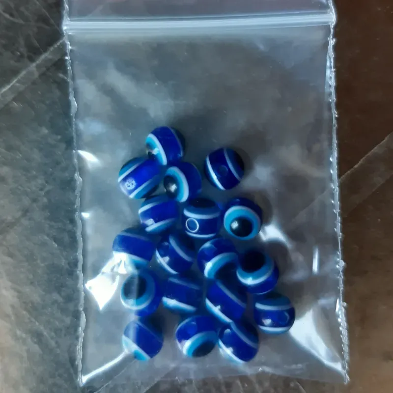 OJO TURCO REDONDO 6 MM 18 UNIDADES