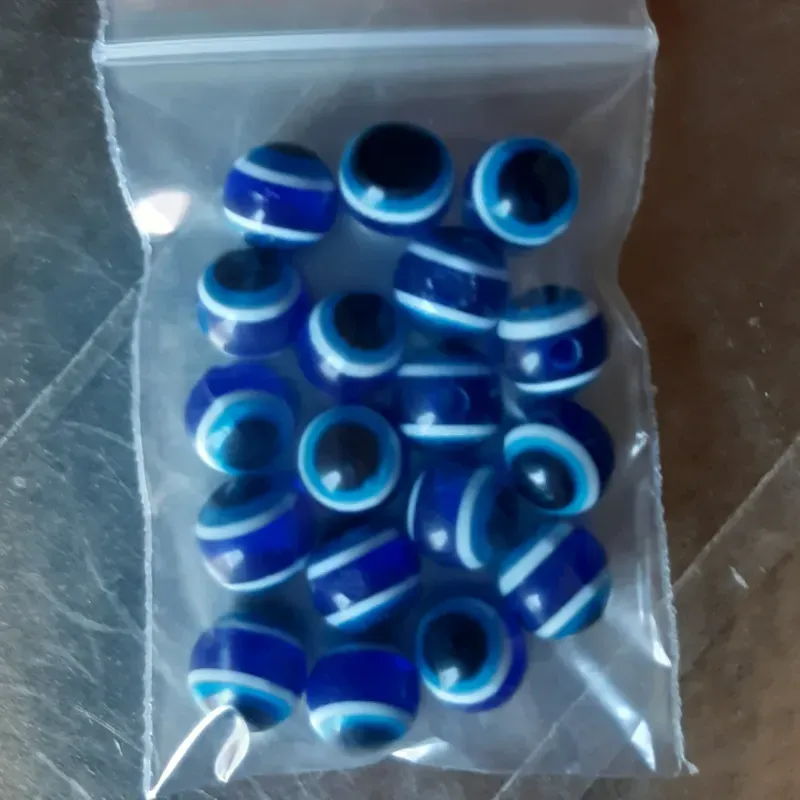 OJO TURCO REDONDO 8 MM 18 UNIDADES