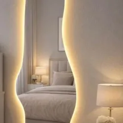 Espejo vestidor con bordes irregulares y luz led
