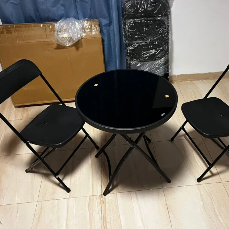 Juego de mesa de con dos sillas plegables