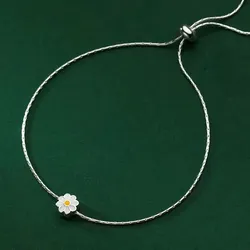 Pulsera fina con flor en centro