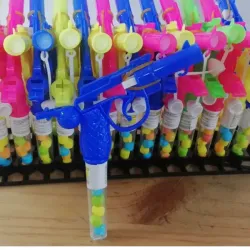 Pistola con caramelos