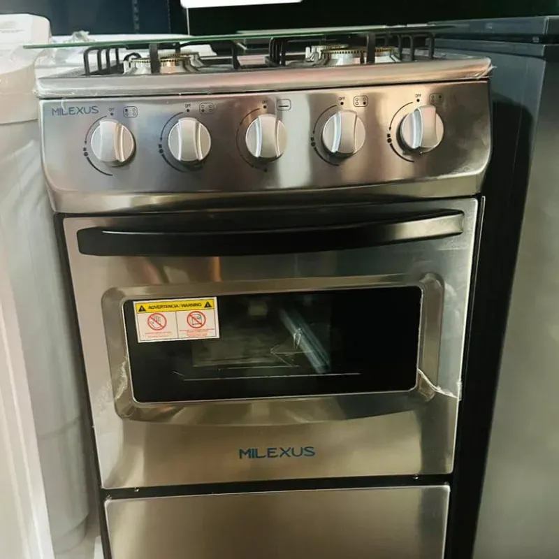 Cocina con horno Milexus 4 hornillas ,plateada 