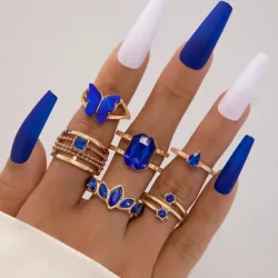 Anillos plateados con piedras azules