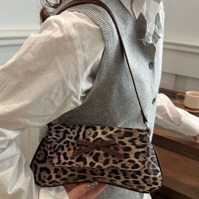 Cartera elegante animal print