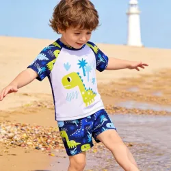 Conjunto de playa con dinosaurio