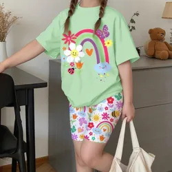 Conjunto verde con arcoíris de niña