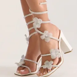 Sandalias altas de flores