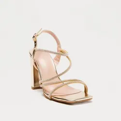 Sandalias doradas de tacón