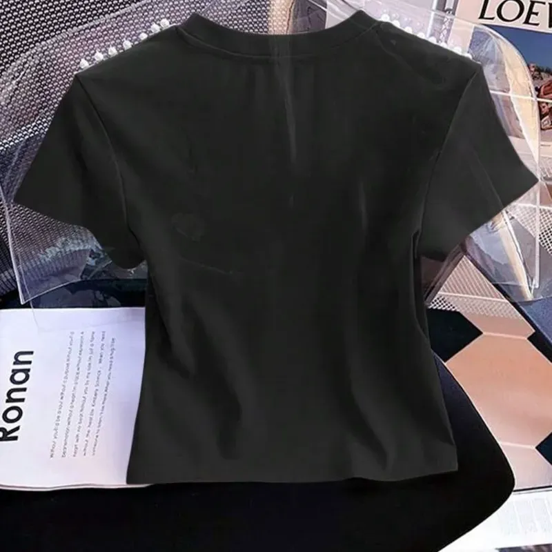 Pullover negro con perlas