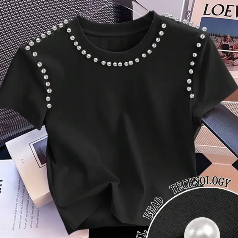 Pullover negro con perlas