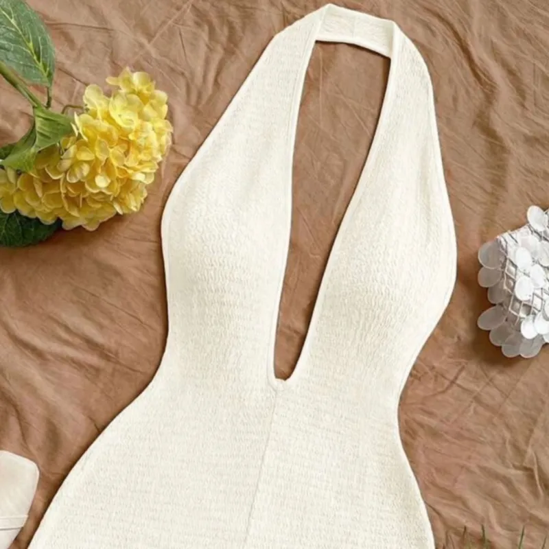 Romper blanco con la espalda afuera