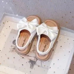 Sandalitas blancas con lazo