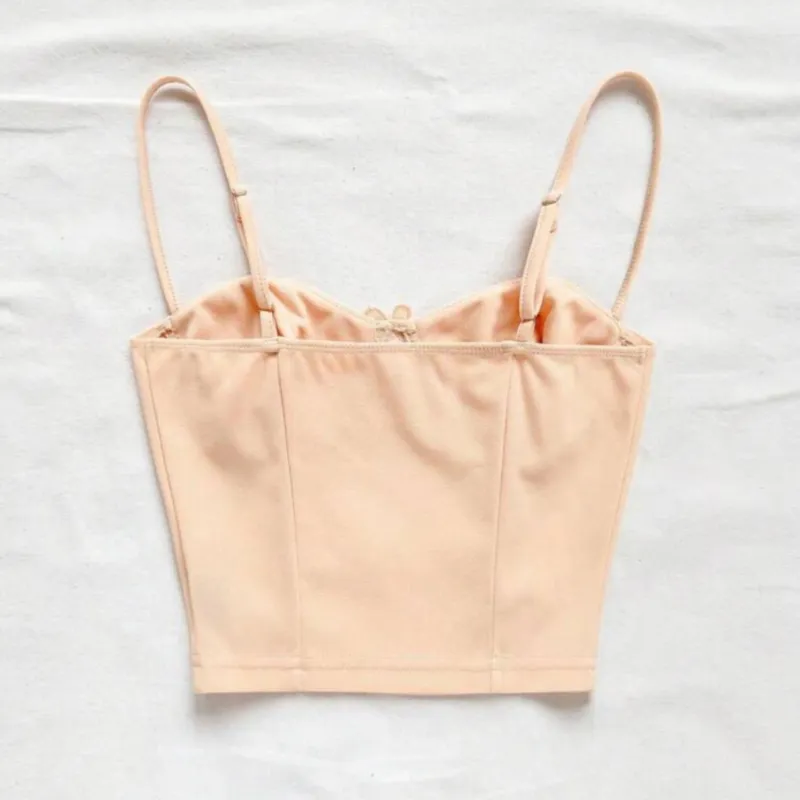 Top beige con detalles de flores