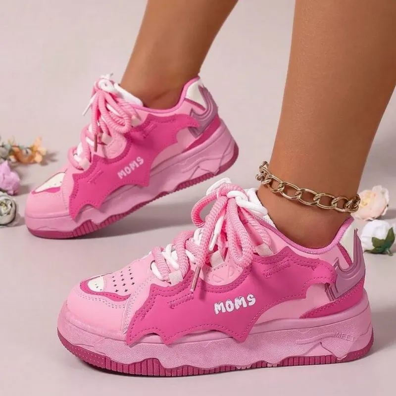 Zapatillas rosadas y blancas