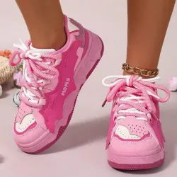Zapatillas rosadas y blancas