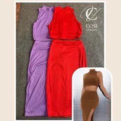 Conjunto de top desmangado  y saya(tela espagueti ) 