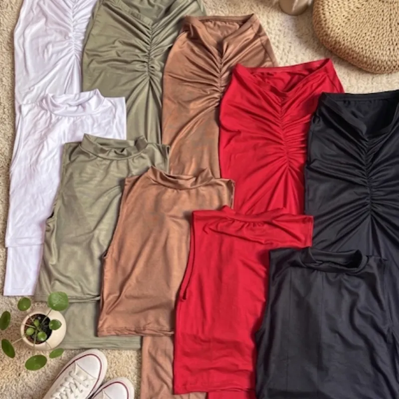 Conjuntos de saya con pliegue