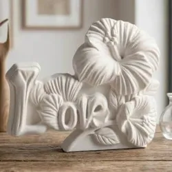 Amor floral. Figura decorativa de yeso