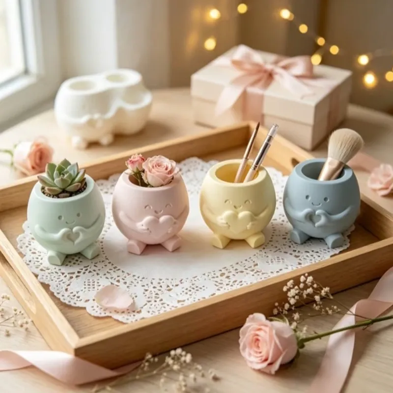 Dúo Corazón. Set de dos adorables macetas con caritas sonrientes y corazones