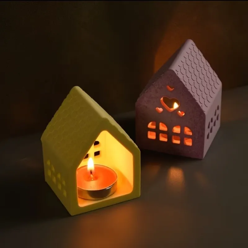 Luminaria de yeso con diseño de corazón. No incluye vela