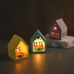 Luminaria de yeso con diseño de corazón. No incluye vela