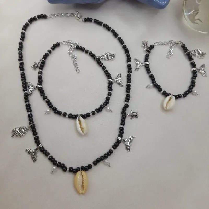 Conjunto de pulsera, tobillera y collar