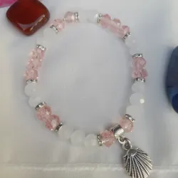 Pulsera de sharowski con dije