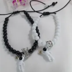 Pulseras de parejas de piedra onix con astronautas