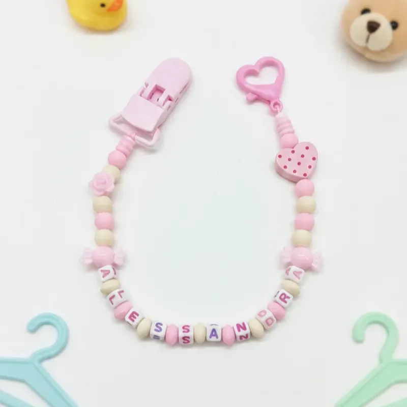 Chupetero corazón rosa