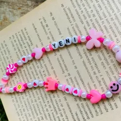 Colgante de celular rosa