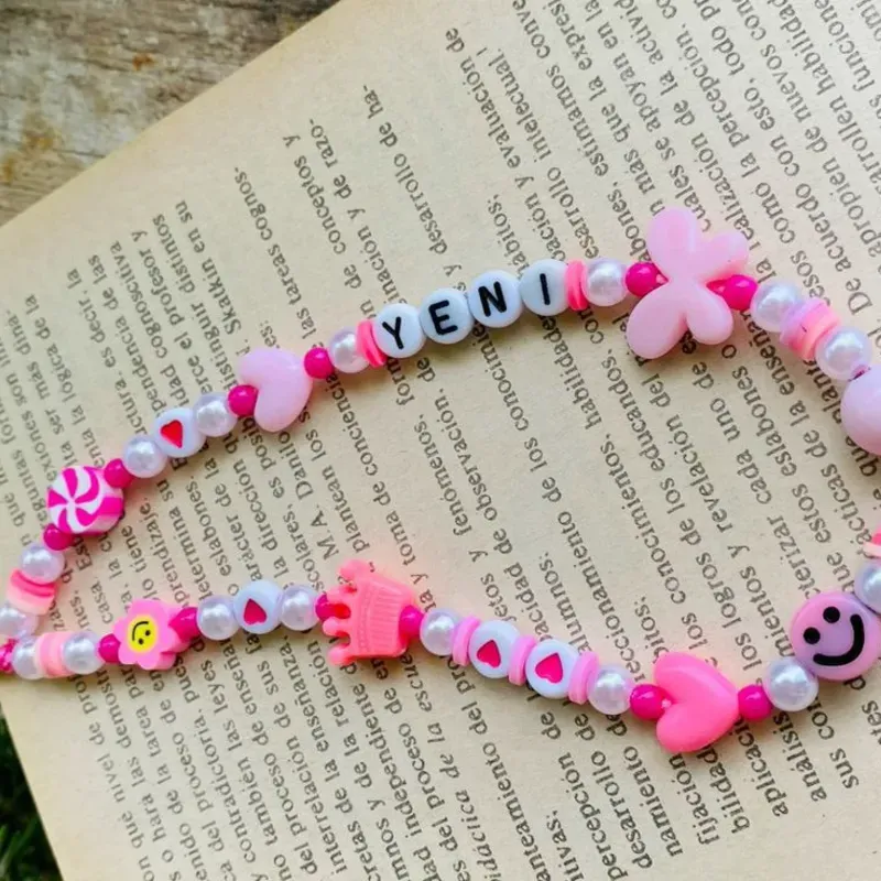 Colgante de celular rosa