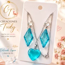 Juego de cadena de acero inoxidable con aretes.