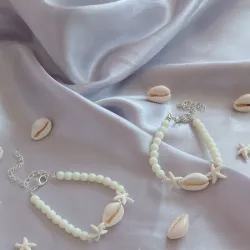 Pulsas con conchas marinas 