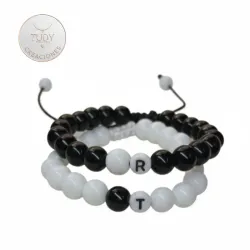 Pulsos de parejas Onix blanco y negro 