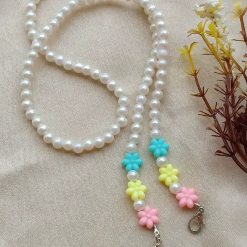 Sujetador de lentes de perlas blancas