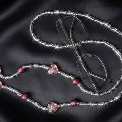 Sujetador de lentes y espwjuelos