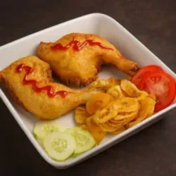 Pollo frito muslo y contramuslo