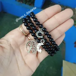 Pulsa de perlas con dije