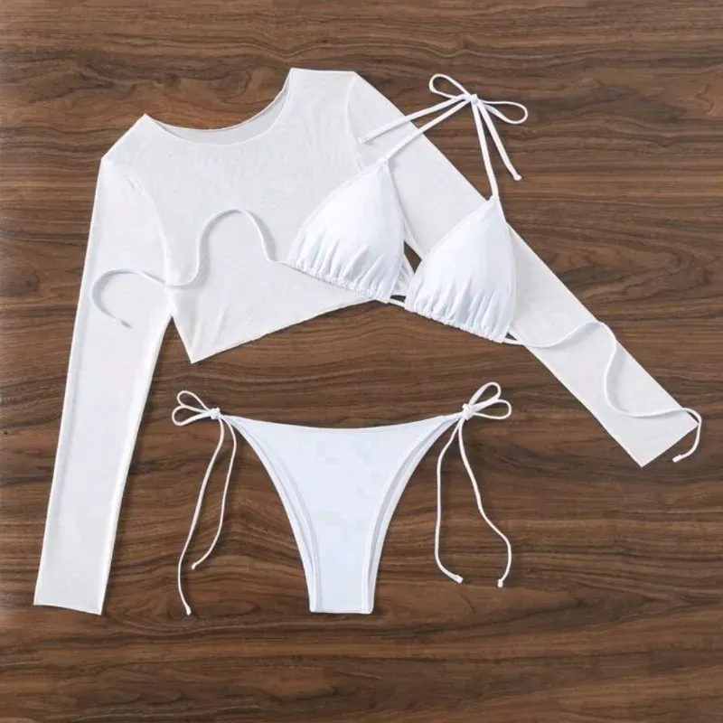 Bikini blanco con blusa mangas largas transparente 