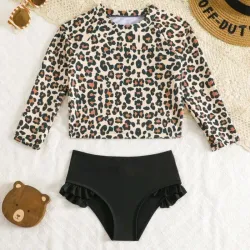Bikini de mangas largas negro y animal print