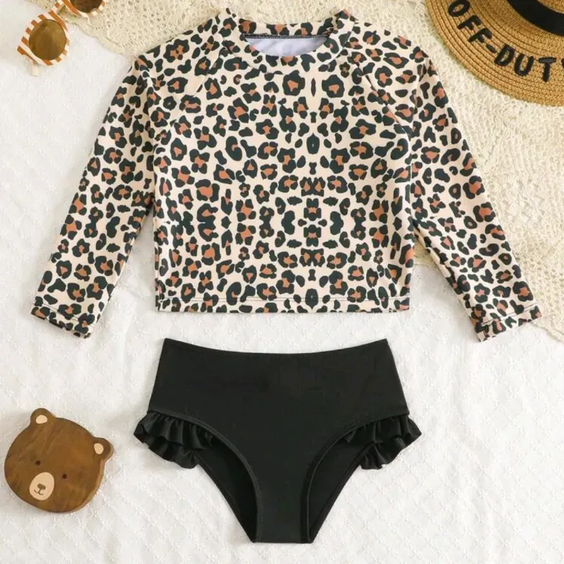 Bikini de mangas largas negro y animal print