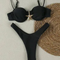 Bikini negro con adorno de estrella metálica