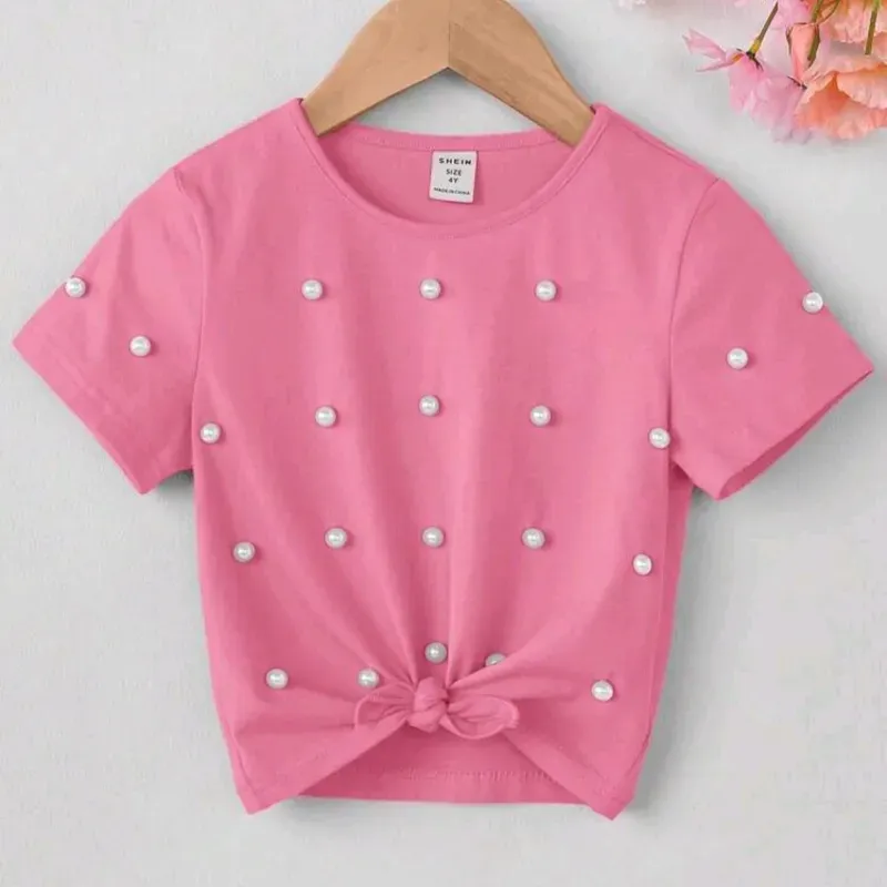 Camiseta rosa d manga con perlas