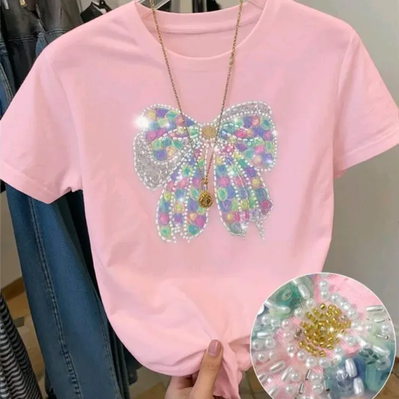 Camiseta rosa lazo con pedrería 
