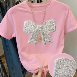 Camiseta rosada d lazo con pedreria