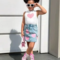 Set d dos piezas top sin manga rosa falda vaquera 