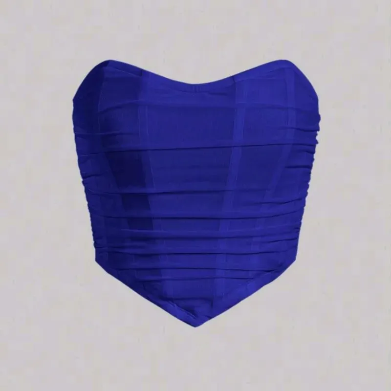Top azul con bajo en pico y ziper atrás 