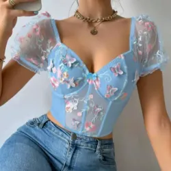 Top azul con mariposas 3d